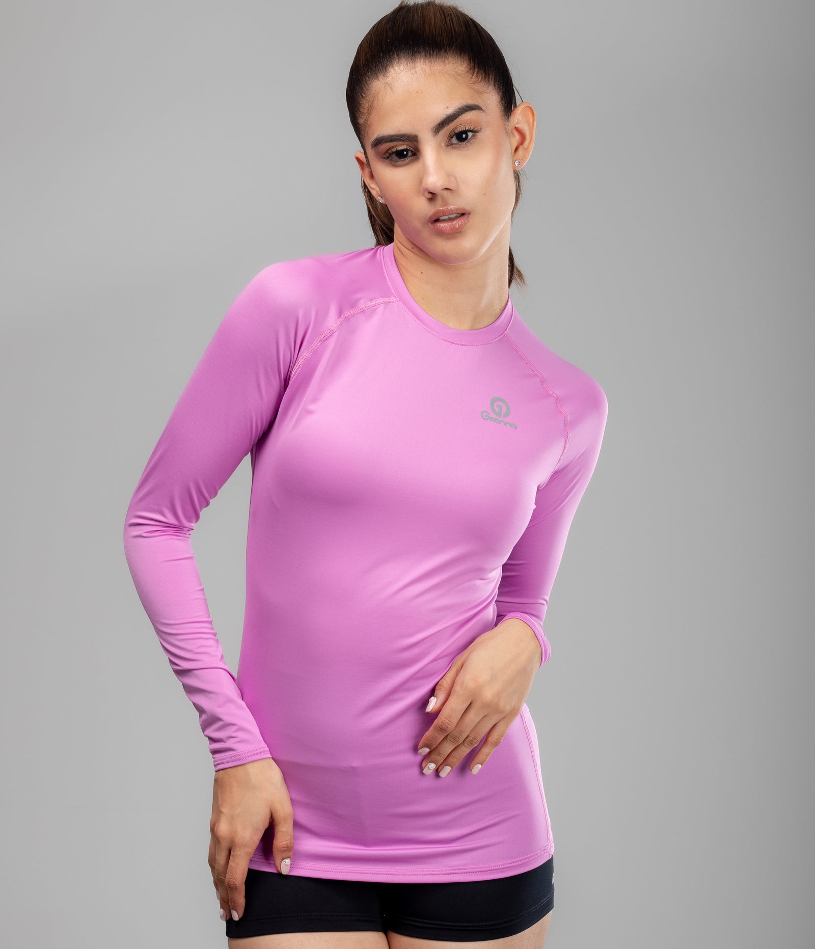 Buzo Compresión MLM 2 para mujer en fucsia, vista frontal