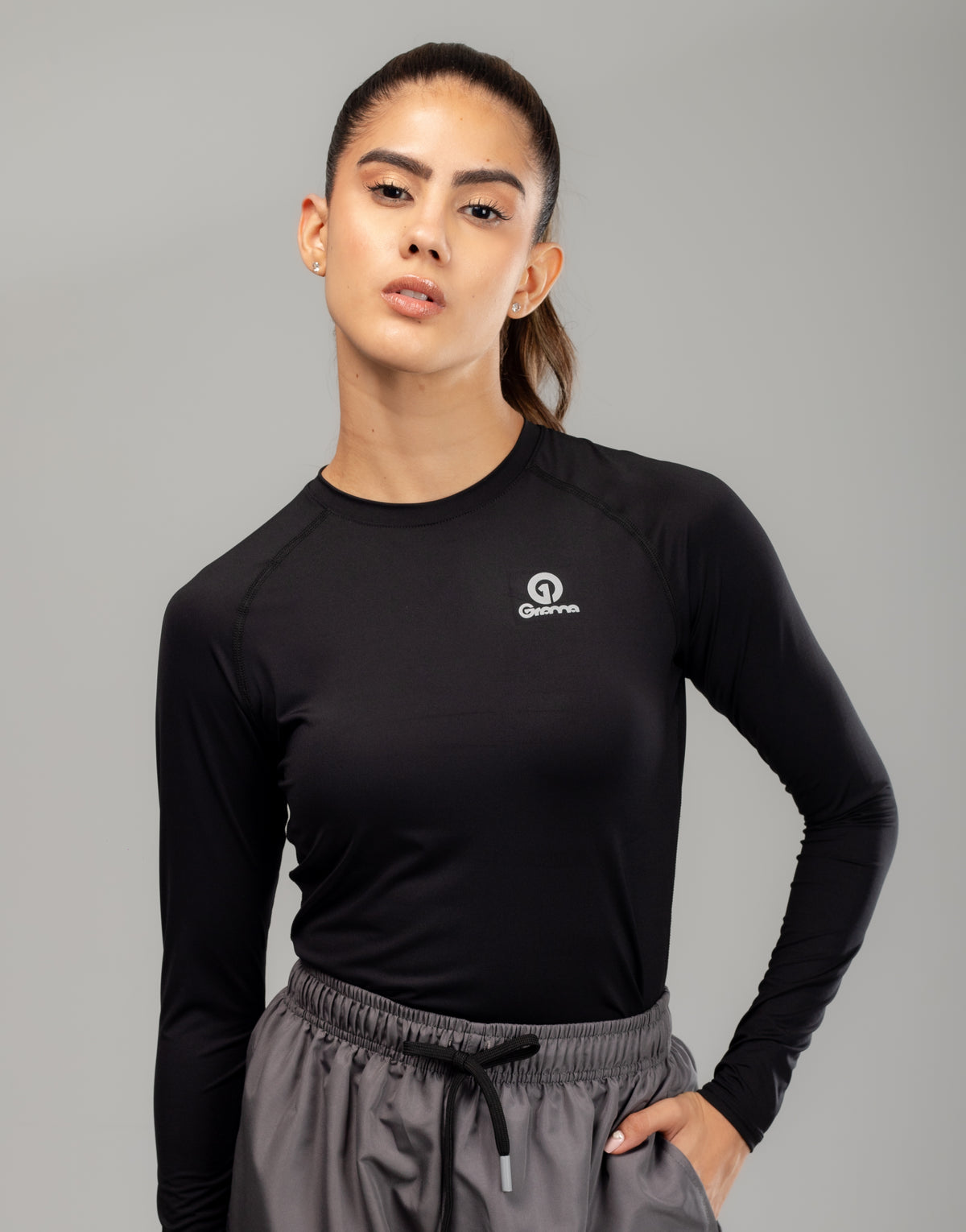 Buzo Compresión MLM 2 para mujer en negro, vista frontal