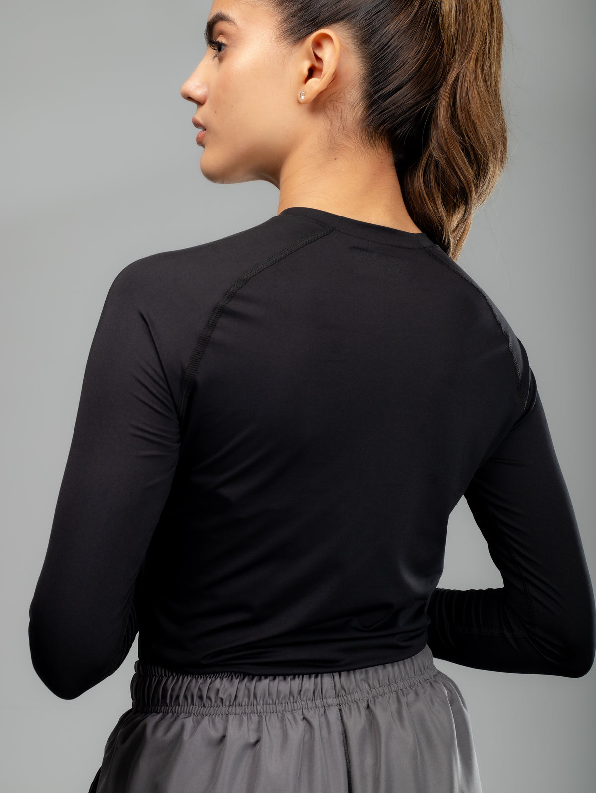 Buzo Compresión MLM 2 para mujer en negro, vista posterior