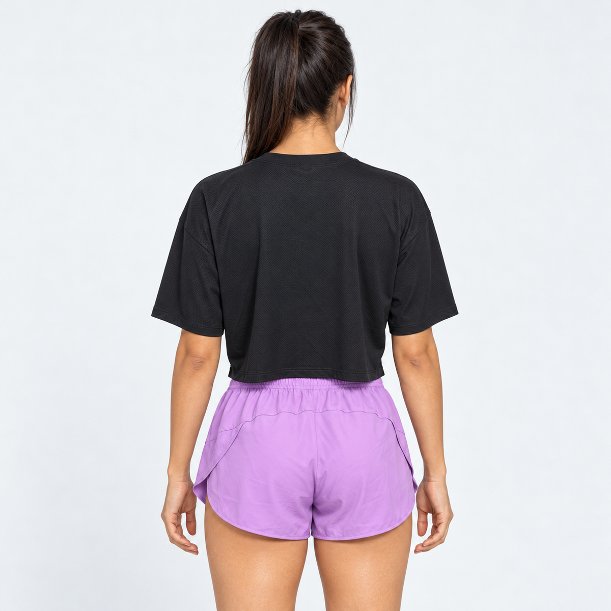 Vista posterior de Blusa Over Crop 1 negra de Grama, diseño oversized con hombros caídos y corte crop