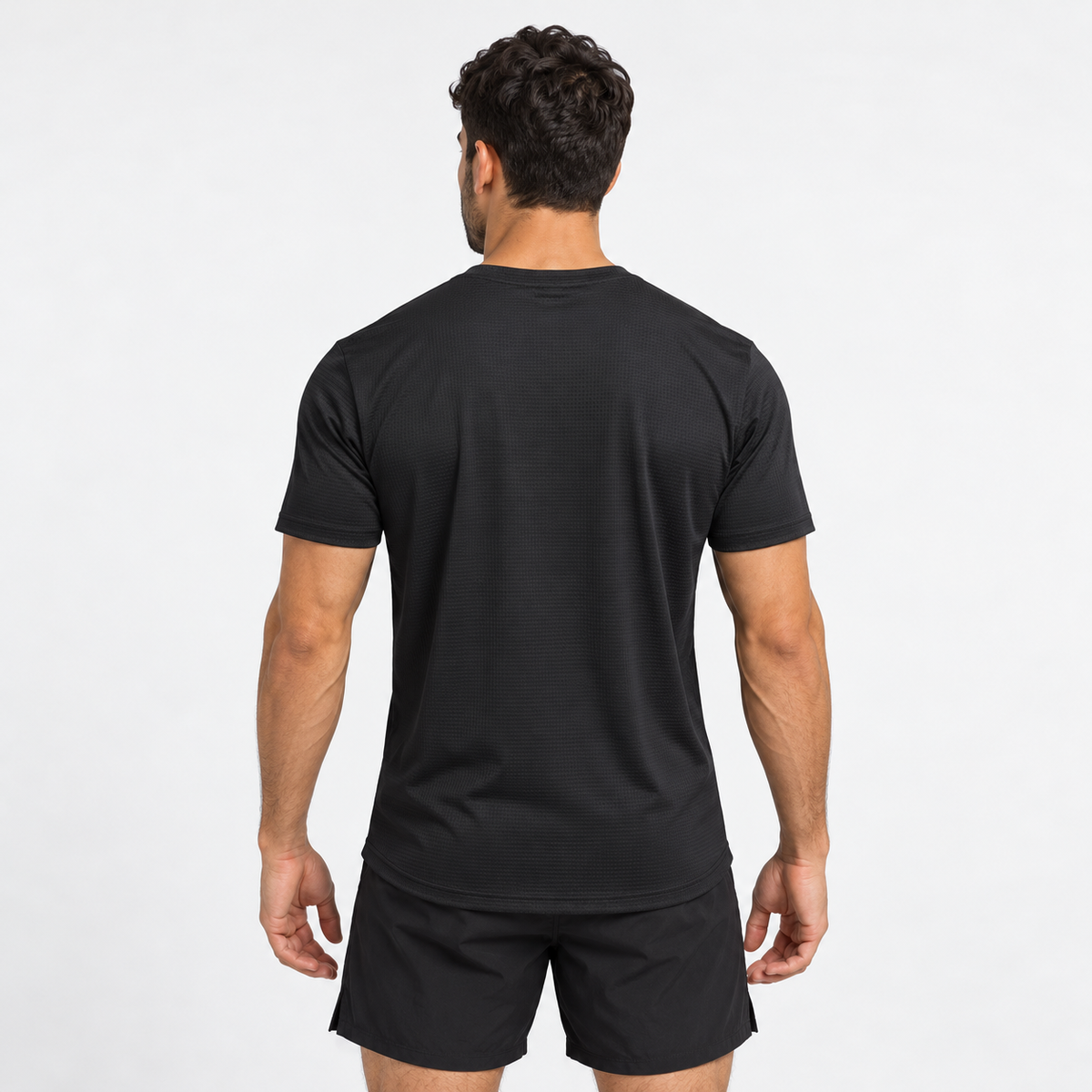 Camiseta deportiva Essentials Grama negra para hombre, vista posterior
