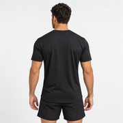 Camiseta deportiva Essentials Grama negra para hombre, vista posterior