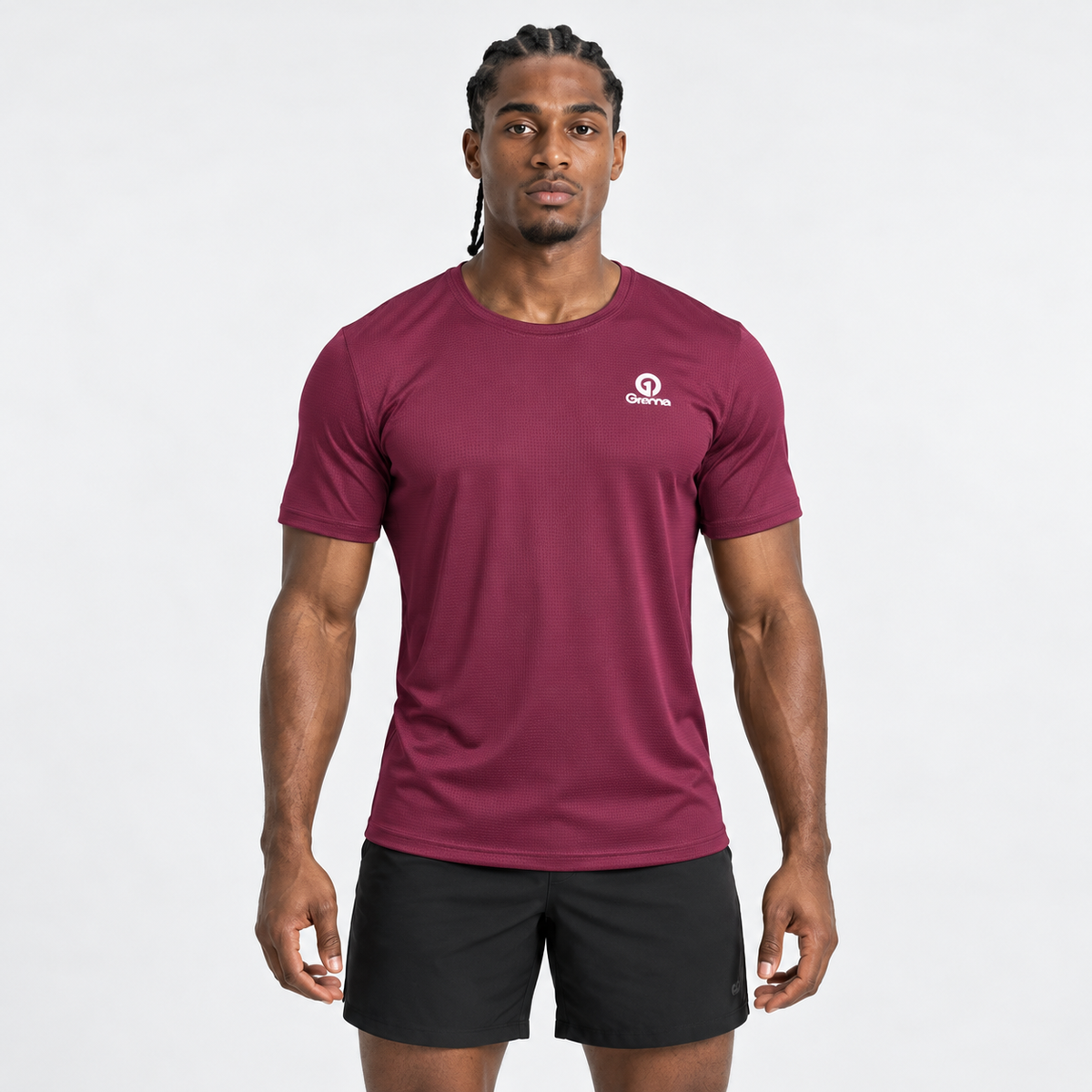 Hombre usando camiseta deportiva Essentials Grama vino tinto, vista frontal