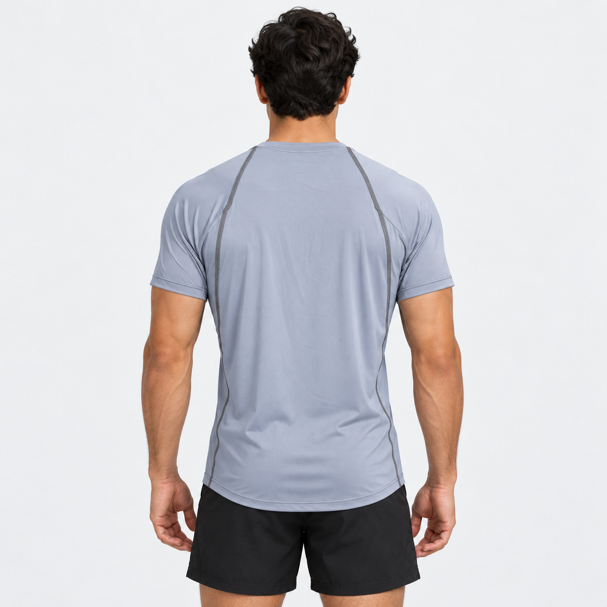 Vista posterior de la camiseta Kaisen gris, con mangas cortas y costuras en contraste sobre la espalda