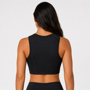 Top Niza negro para mujer vista posterior mostrando la espalda cubierta y la banda inferior