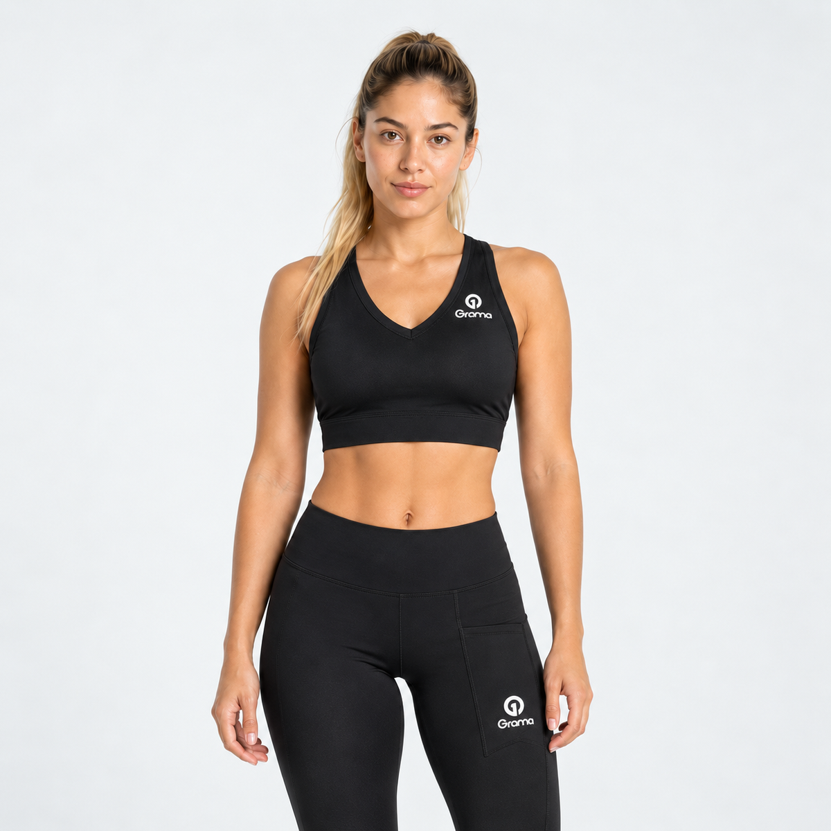 Top deportivo Niza negro para mujer Grama, vista frontal