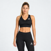 Top deportivo Niza negro para mujer Grama, vista frontal